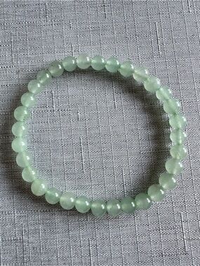 Jade EUC green beaded stretch bracelet. Appx. 6mm beads of genuine gemstone.